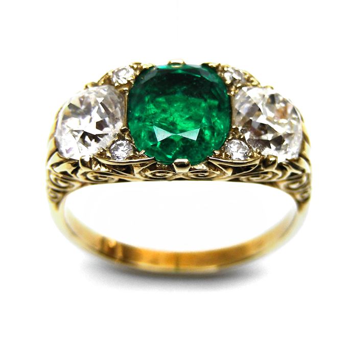 Emerald and diamond three stone carved gold half hoop ring | MasterArt